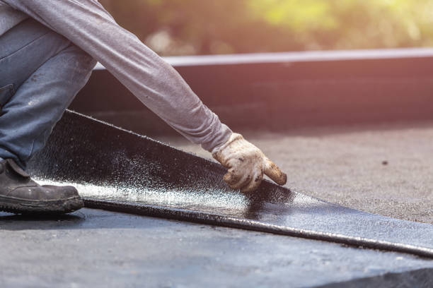Professional Emergency Waterproofing technician working in Troy, IL